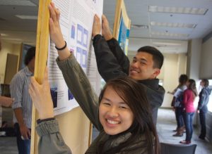 Students from James Logan High School put up their poster at the Monterey Bay Currents Symposium where they will present the scientific results of their LiMPETS Science Communication project