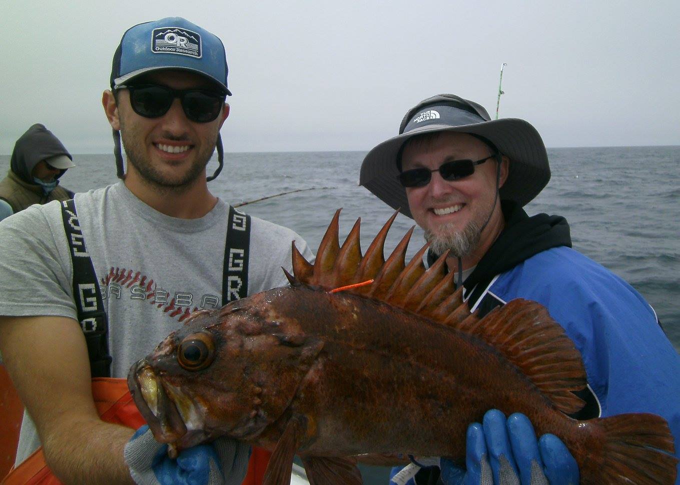 Todd Kennedy holding fish.