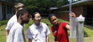 students observing weather station